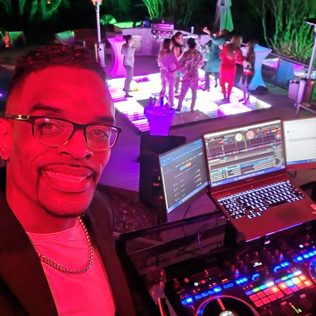 DJ Matt Turner at a Sacramento private party with light-up dance floor and packed crowd